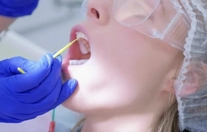 Women getting fluoride treatment