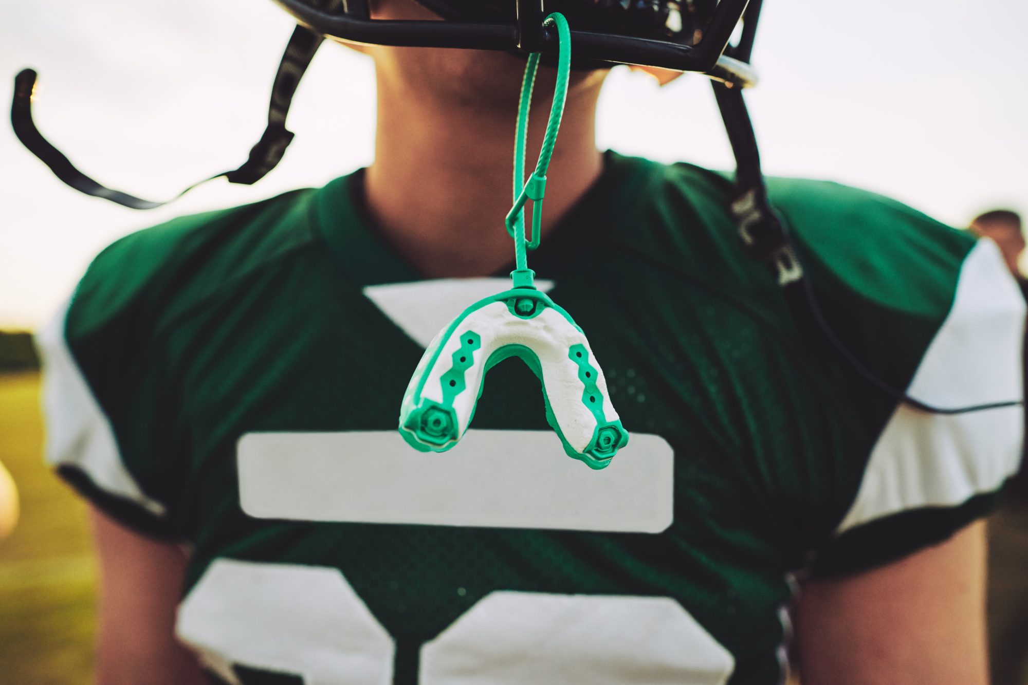 Why Your Child’s Fall Sports Require More Than Just a Helmet: The Custom Mouthguard Advantage